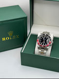 Rolex GMT-Master II “Coke” Bisel Negro y Rojo — Fullset con Caja